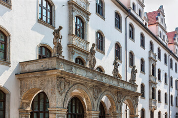 Statues outside Stadtsparkasse Munich building on Sparkassenstrasse (street), Munich, Germany.