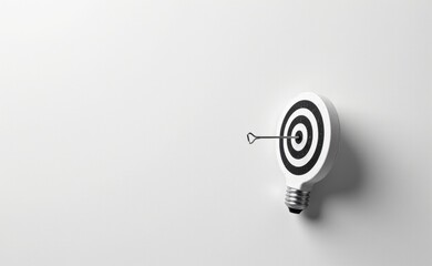 A single dart hitting the bullseye, mounted on a white wall.