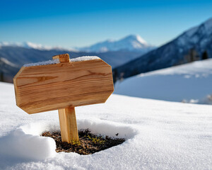 Naklejka premium small wooden pancarte, area for text, snowy setting, with mountain decorations in the background