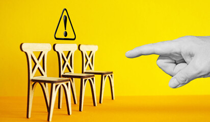 You're fired concept. Staff being fired by large boss hand