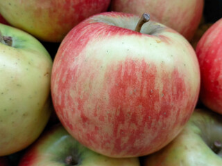 Fresh apples on the market. Agricultural background texture