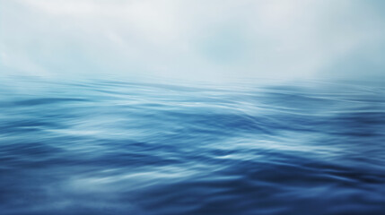 Fototapeta premium Calm blue ocean with gentle waves under a cloudy sky. The tranquil water creates a peaceful and serene atmosphere