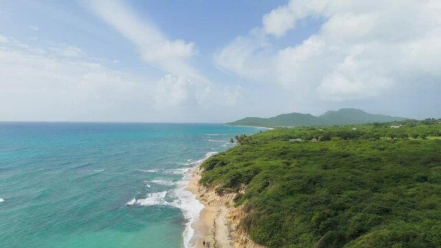 Drone footage of the Black Sand Beach (Playa Negra) on a sunny day in Vieques, Puerto Rico