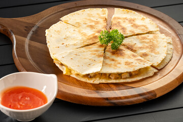 Mexican pies placed on wooden boards