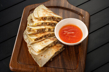 Mexican pies placed on wooden boards
