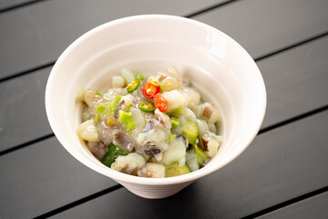 Japanese cuisine, mustard octopus sashimi in a white bowl