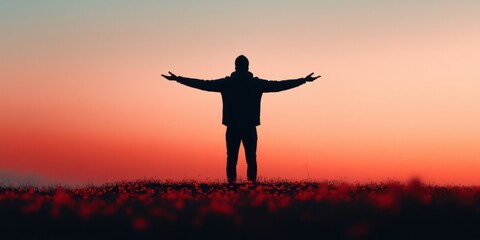 Fototapeta premium Silhouette of person embracing sunrise in tranquil landscape