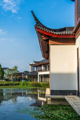Traditional Chinese Architecture by Tranquil Pond