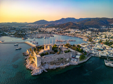 Aerial view of bodrum castle and marina surrounded by beautiful boats and scenic coastline, bodrum, turkey.