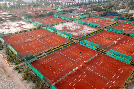 Belek, Turkey - 21 April 2008: Aerial view of beautiful clay tennis courts with athletes in action, Belek, Turkey.