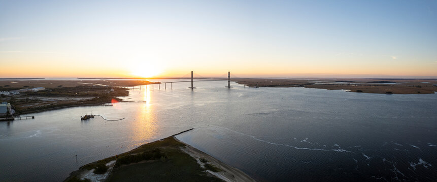 Aerial view of sidney lanier bridge over brunswick river at sunset, brunswick, usa.