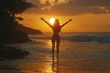 Fototapeta premium Young woman practicing yoga on a beach at sunrise tranquil scene nature serene environment inspirational concept
