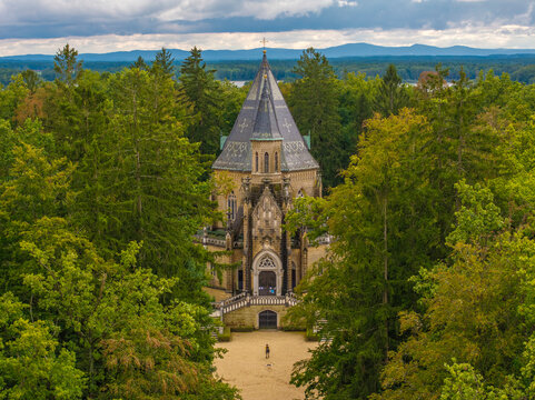 Aerial view of the historic schwarzenberg tomb surrounded by trees in a serene forest, Trebon, Czech Republic.