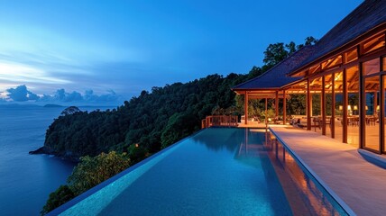 Obraz premium Modern Luxury Home Perched on a Cliff Overlooking the Sparkling Azure Sea