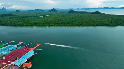 Aerial view of the beautiful Panyee Village with karst islands and a floating city, Phang Nga, Thailand.