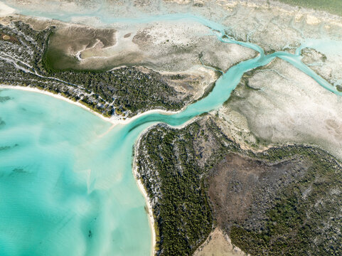 Aerial view of beautiful turquoise water and serene coastline with sandy beaches, South Eleuthera, The Bahamas.