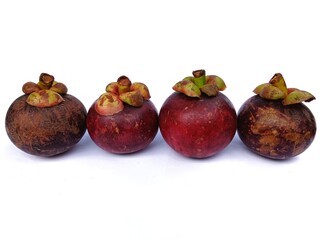 Purple Mangosteens isolated on white background, Fresh highest variety Mangosteens on White Background With clipping path.