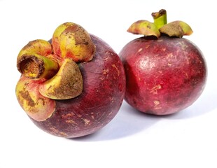 Purple Mangosteens isolated on white background, Fresh highest variety Mangosteens on White Background With clipping path.