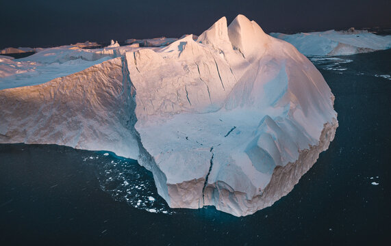 Aerial view of majestic icebergs in Disco Bay, Ilulissat, Greenland.
