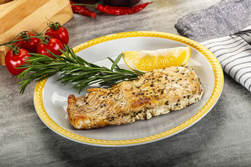 Baked salmon fish served rosemary