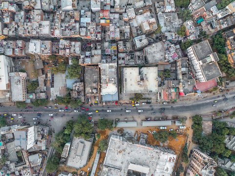 Aerial view of bustling urban landscape with dense buildings and busy streets, Subhash Nagar, Jaipur, India.