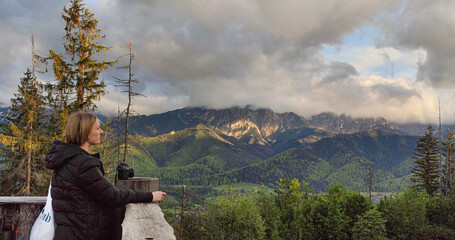 Young tourist girl travels through the mountains of Zakopane © Tetiana