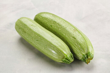 Raw green ripe zucchini vegetable