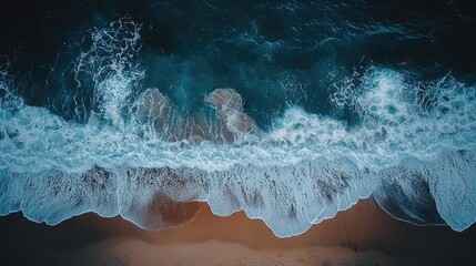 Fototapeta premium Ocean Waves Crashing on Sandy Beach: An Aerial View of Coastal Beauty