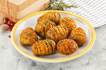Baked baby potato with thyme