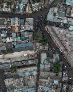 Aerial view of bustling Kote Gate with crowded streets and vibrant buildings, Bikaner, India.