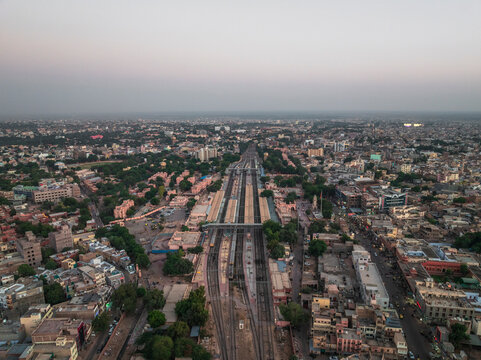 Aerial view of bustling cityscape with railway and train station, Kote Gate, Bikaner, India.