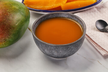 Sweet mango puree in the bowl