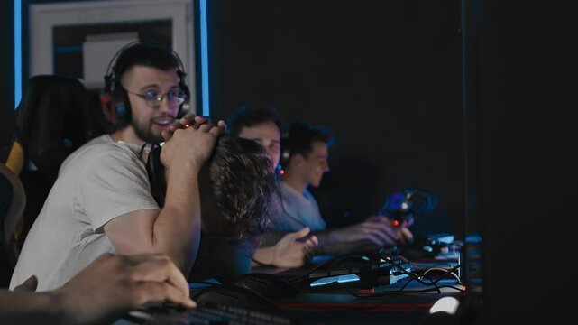 Cyberteam defeat and lose map due to teammate mistake, gamer choked round in match, noob threw game and and held his head. Disappointment fault. Pro team is participating in Esports event at LAN club