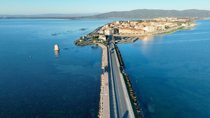 Fototapeta premium Laguna di Orbetello in Toscana, Italia. Vista aerea ripresa da drone, del borgo e della laguna che affaccia sul Monte Argentario.