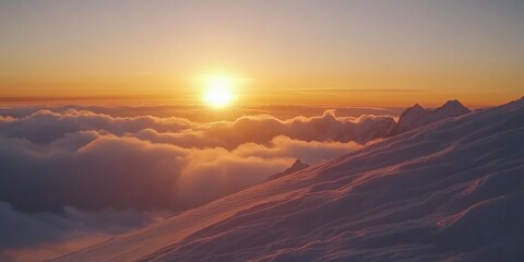 Fototapeta premium Sunrise above the clouds, glowing orange sky with soft white layers below