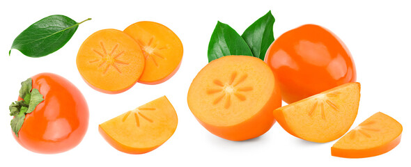 fresh ripe persimmons with cut of persimmon and green leaves isolated on white background. clipping path
