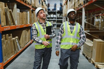 Two warehouse workers. Logistic and business export concept