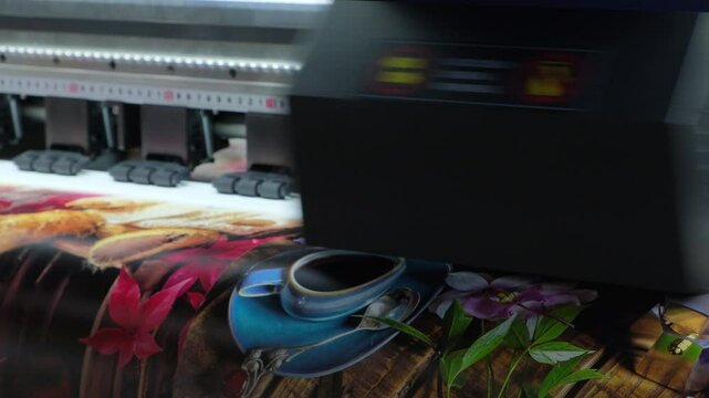 Industrial printing on woven material a modern digital inkjet printer applies a pattern to a fabric or paper