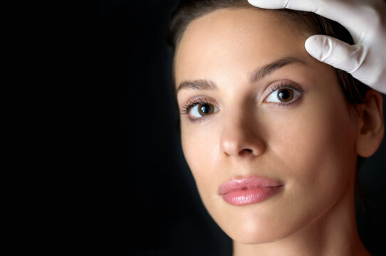 Close up of a woman's face during a cosmetic examination
