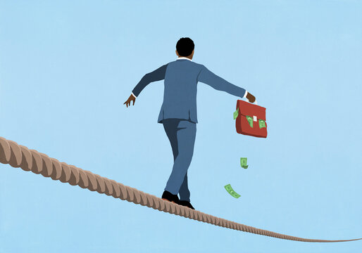 Businessman investor with money briefcase walking precariously over tightrope
