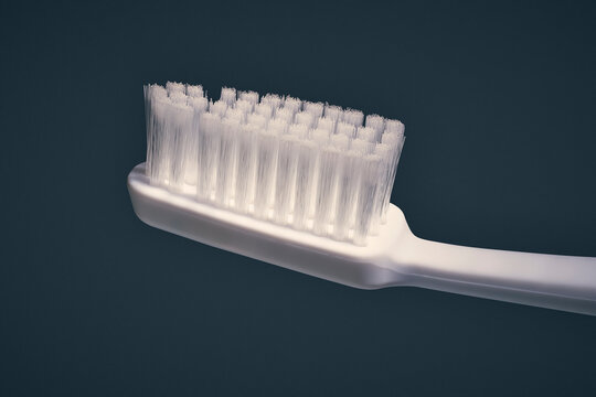 Close up bristles of white toothbrush on black background
