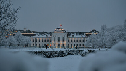 Presidential palace in a snowy winter in Bratislava Slovakia from the garden