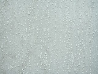 Wet painted metal box detail with thousands of droplets