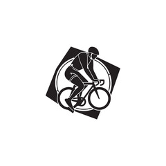 silhouette of a person riding a bicycle