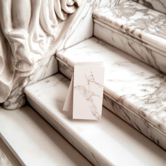 A minimalist business card mockup on a marble plinth, showcasing clean lines and a modern aesthetic. Perfect for branding presentations.