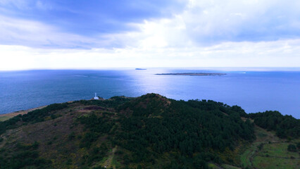 Obraz premium green, emerald, clean, Korea, Jeju Island, beauty, sea, landscape, sky, drone, healing, travel, stone, basalt, wave, harmony, mystery, background