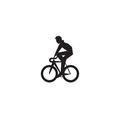 silhouette of a person riding a bicycle
