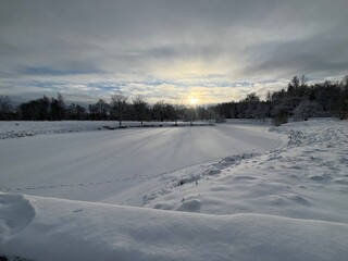 White snow on the ground, sunlight on the snow, natural snowy background