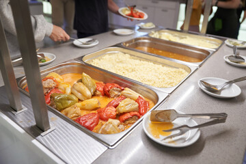 Traditional dishes in metal containers, a buffet with Russian dishes. With space to copy. High quality photo