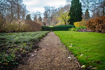 Obraz premium Serene Pathway Through a Lush Garden Landscape